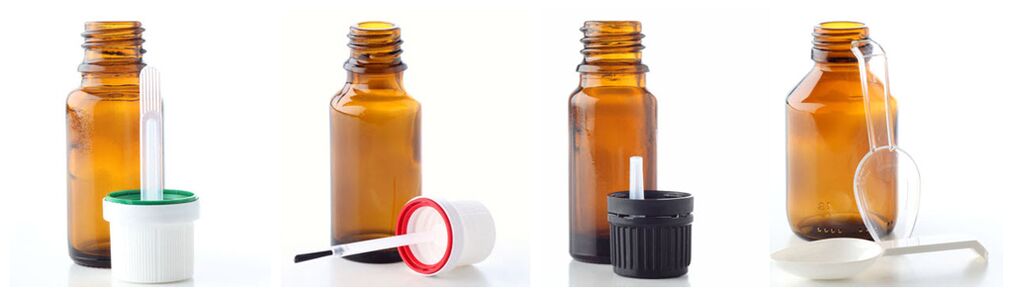 Pipet, borstel, druppeldispenser en maatlepel complementeren glazen flacons voor essentiële oliën
